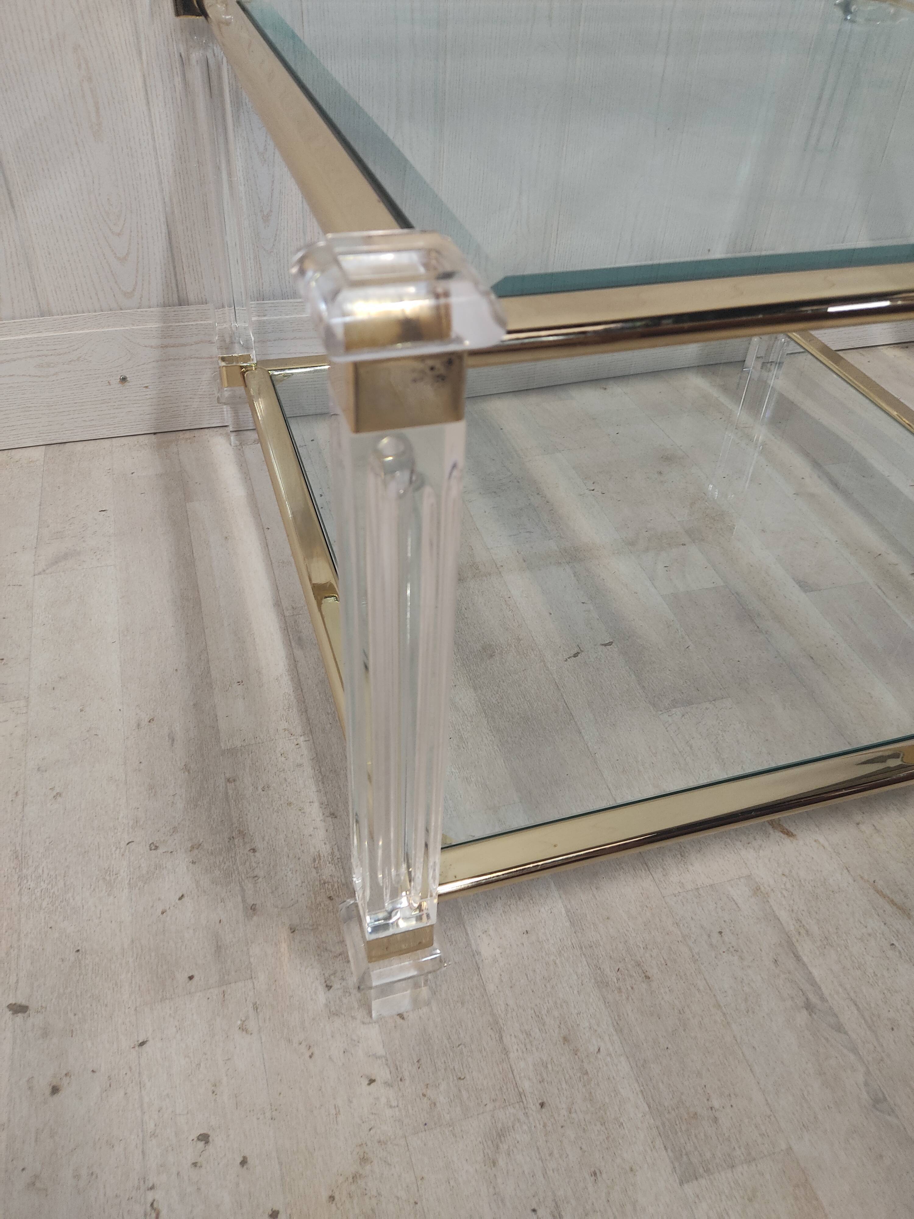 Brass coffee table, beveled glass and altuglas