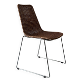 Chair design in rattan, woven wicker and chrome wire metal.