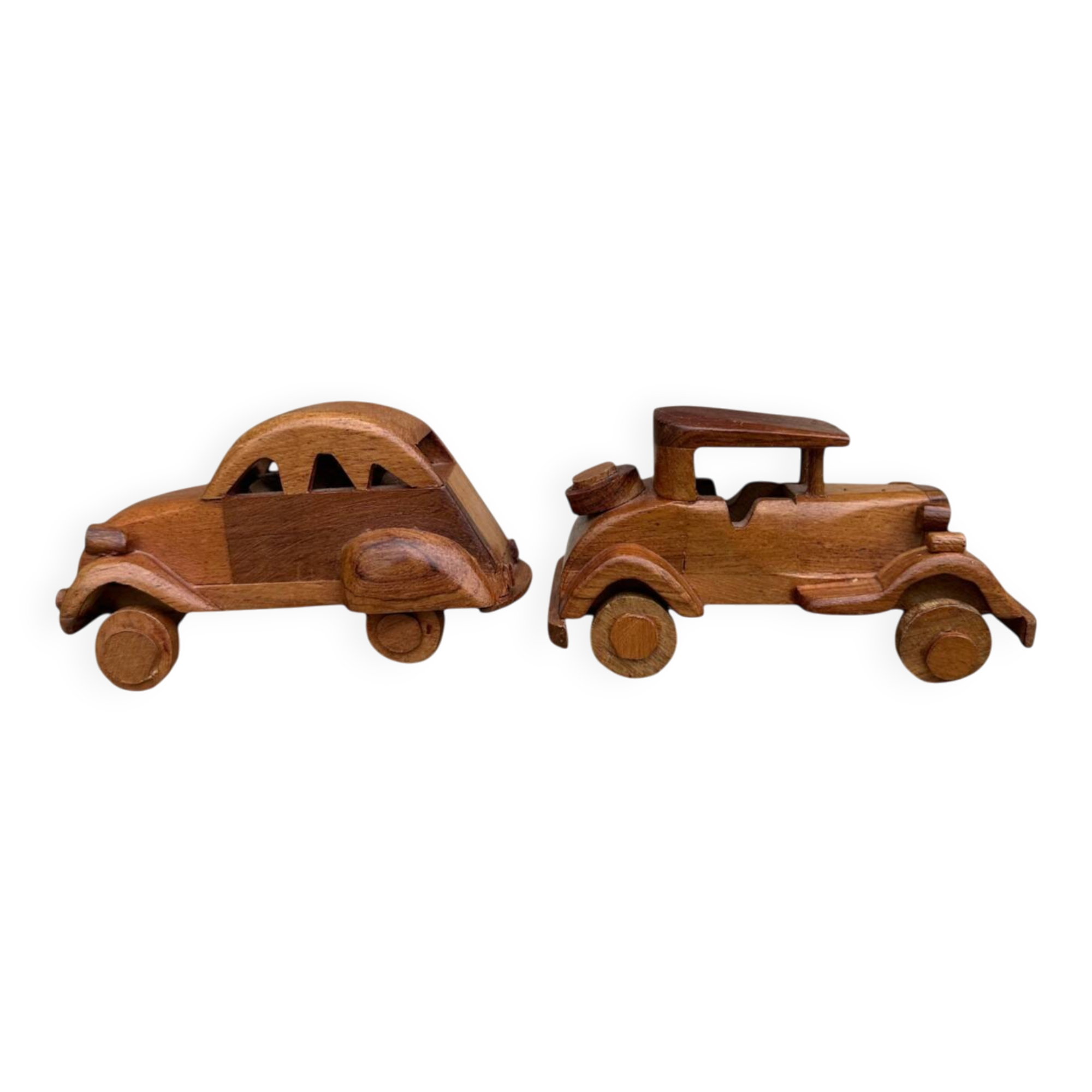 Pair of small handcrafted wooden cars
