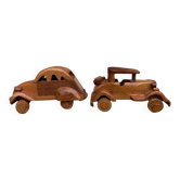 Pair of small handcrafted wooden cars