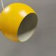Spherical pendant lamp in sunny yellow.