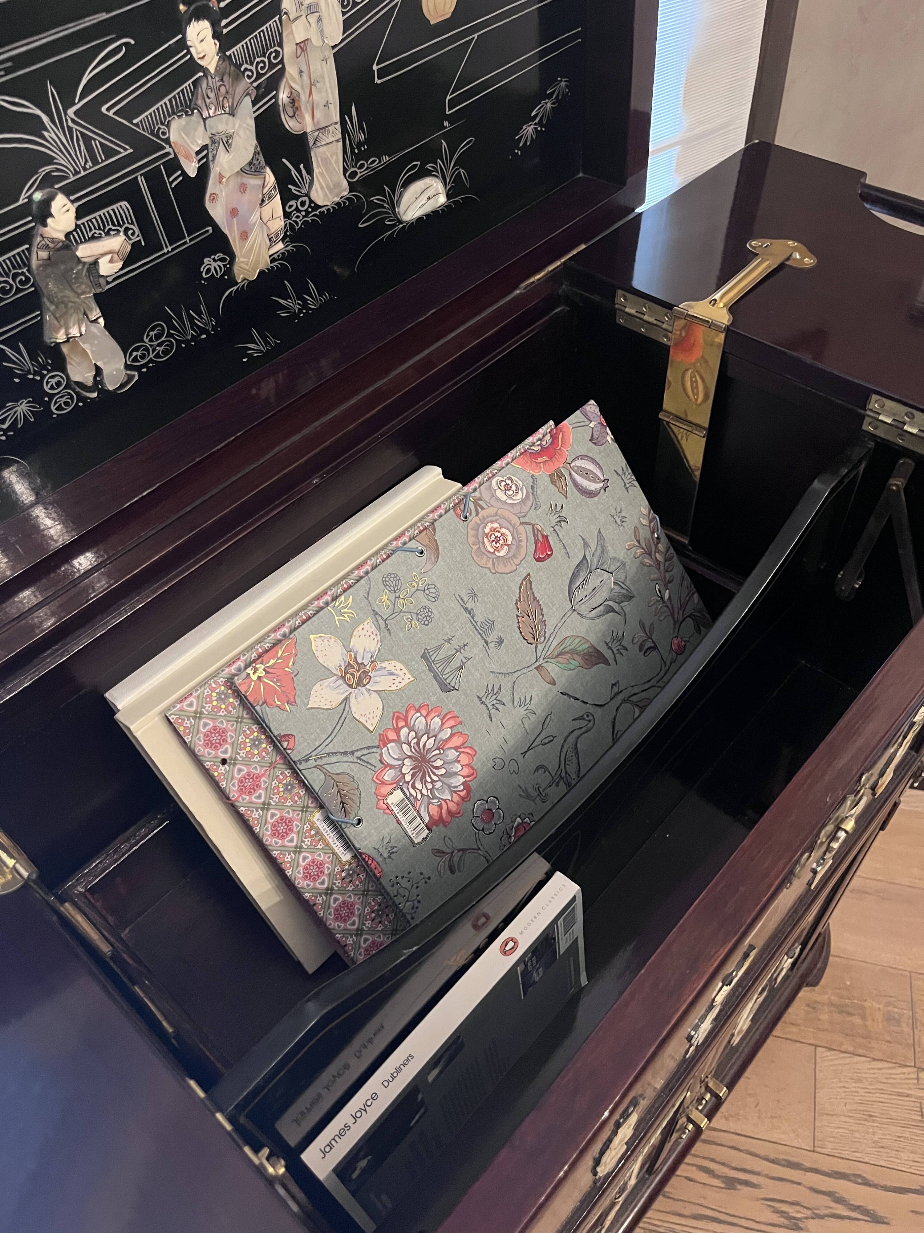 "Chinese black lacquer cabinet, mother-of-pearl inlays, court scenes"