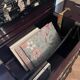 "Chinese black lacquer cabinet, mother-of-pearl inlays, court scenes"