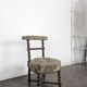 Napoleon III smoking chair in twisted blackened wood with foliage upholstery.