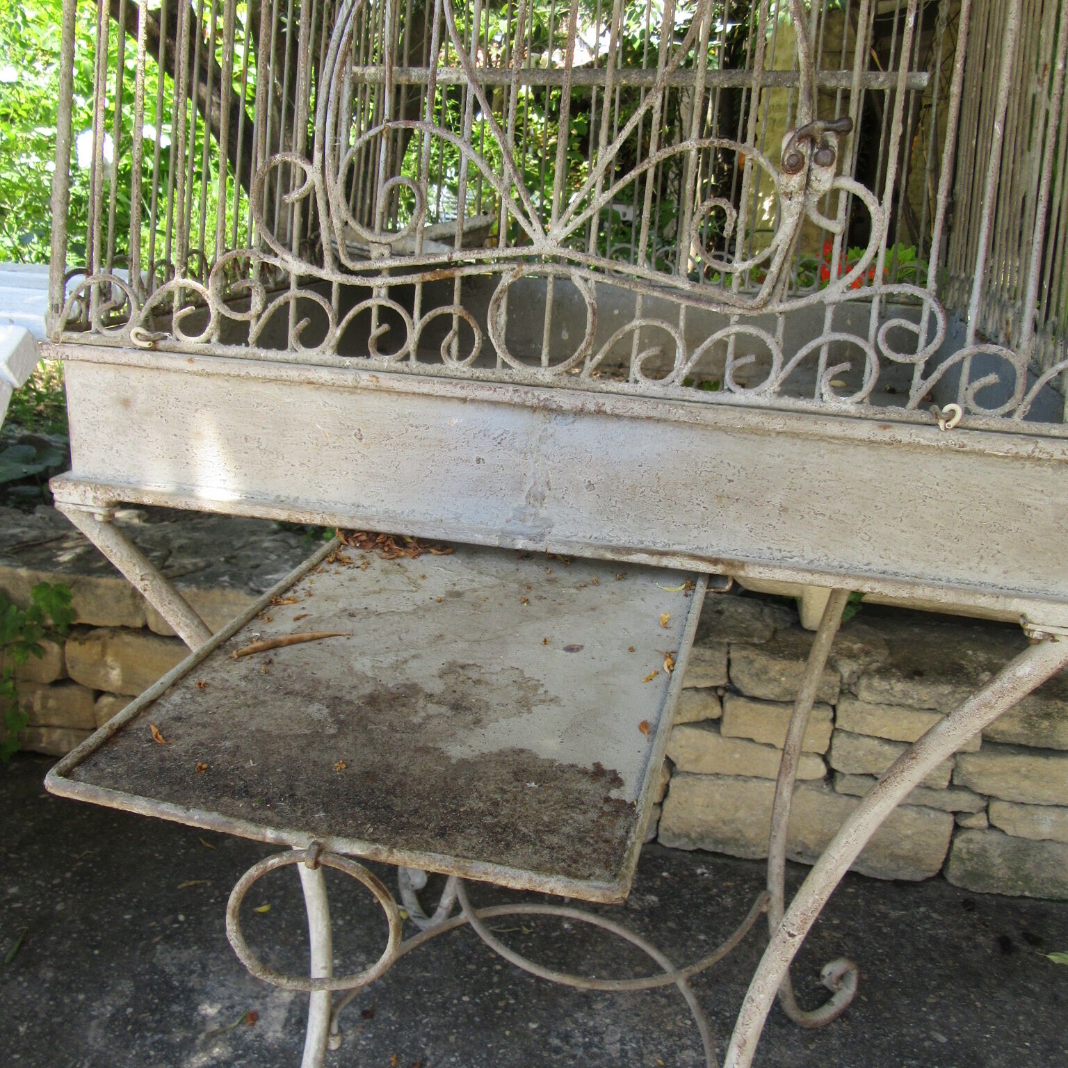 Ancient wrought iron bird cage and welded iron
