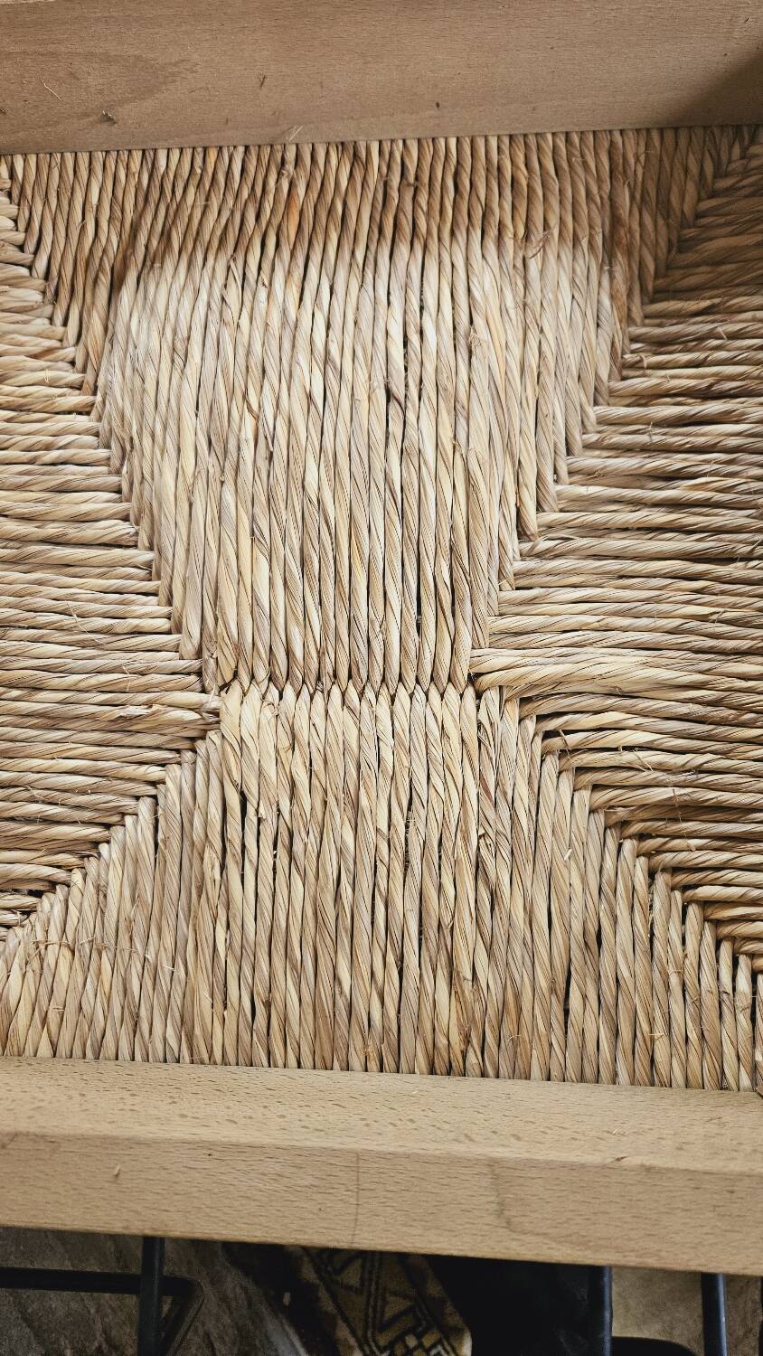 4 straw chairs in the vintage Charlotte Perriand 1970 style