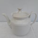 White earthenware teapot