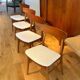 4 vintage Scandinavian "Freya" chairs in natural linen boucle.