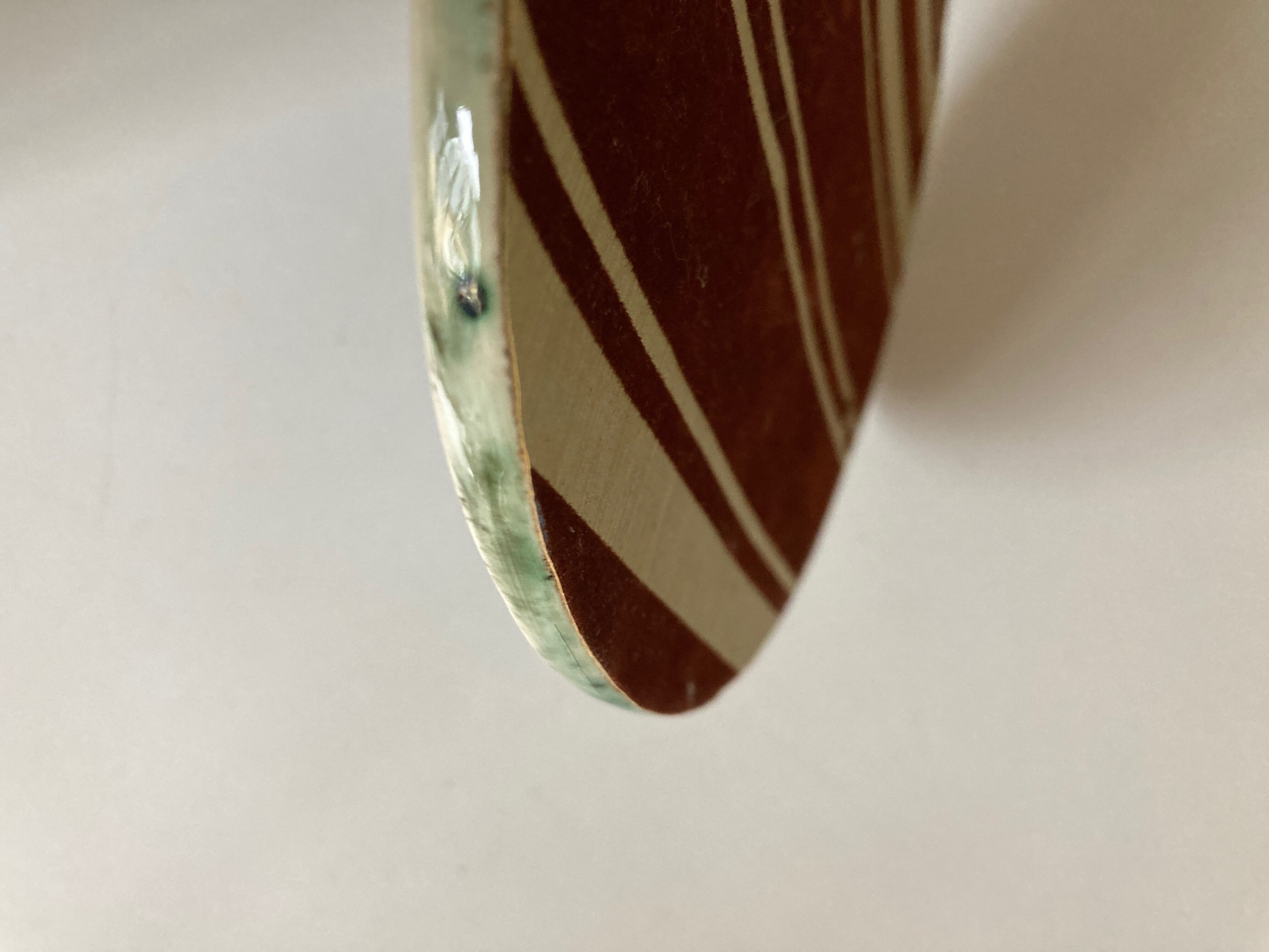 Incised ceramic mirror with flowers 1960