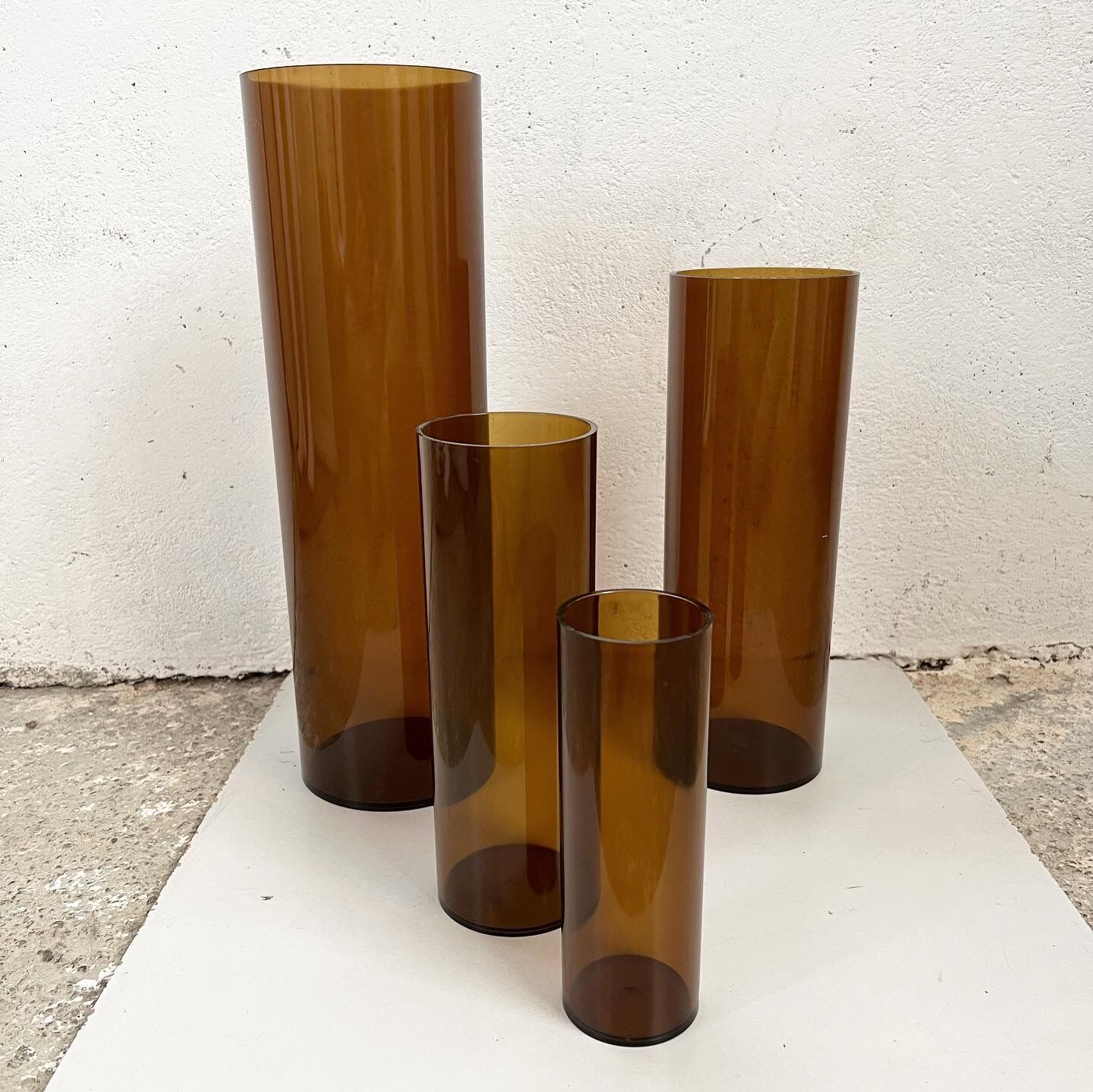 4 Jacques Bédat trundle vases in smoked plexiglass