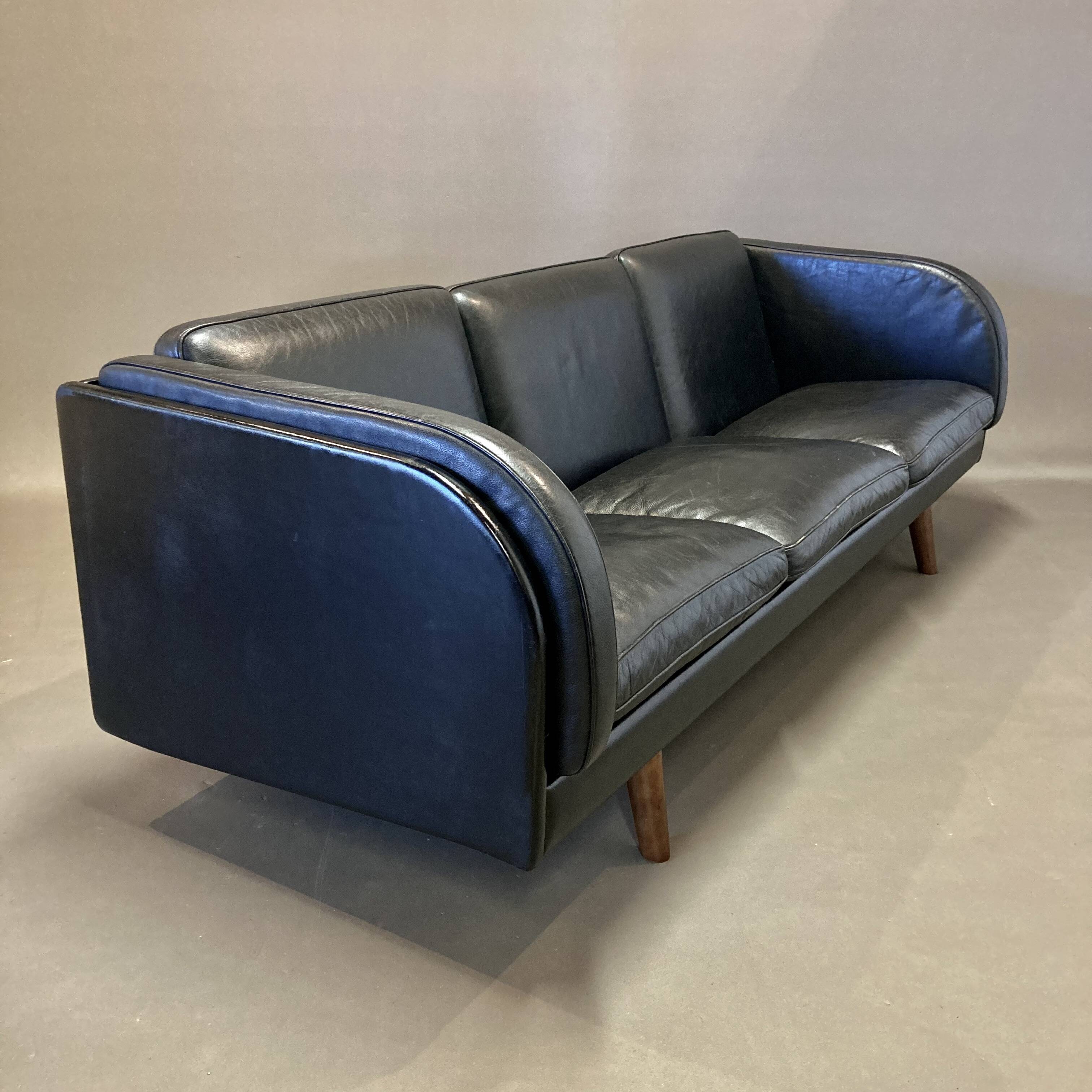3-seater black leather sofa Scandinavian design 1960