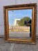 Golden framed mirror