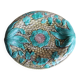 Large wall plate in slipware with a floral decoration.