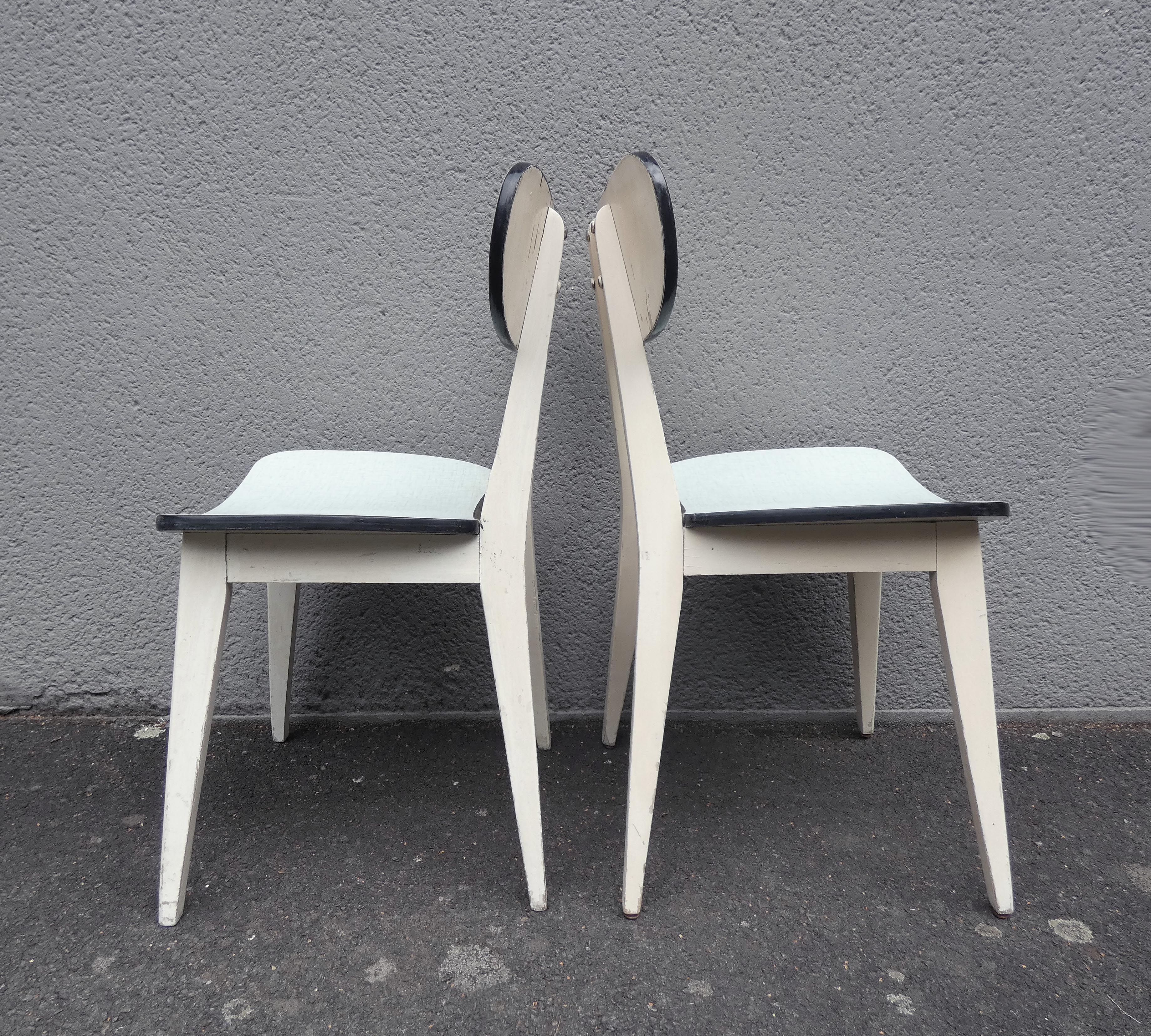 2 chairs in water green formica