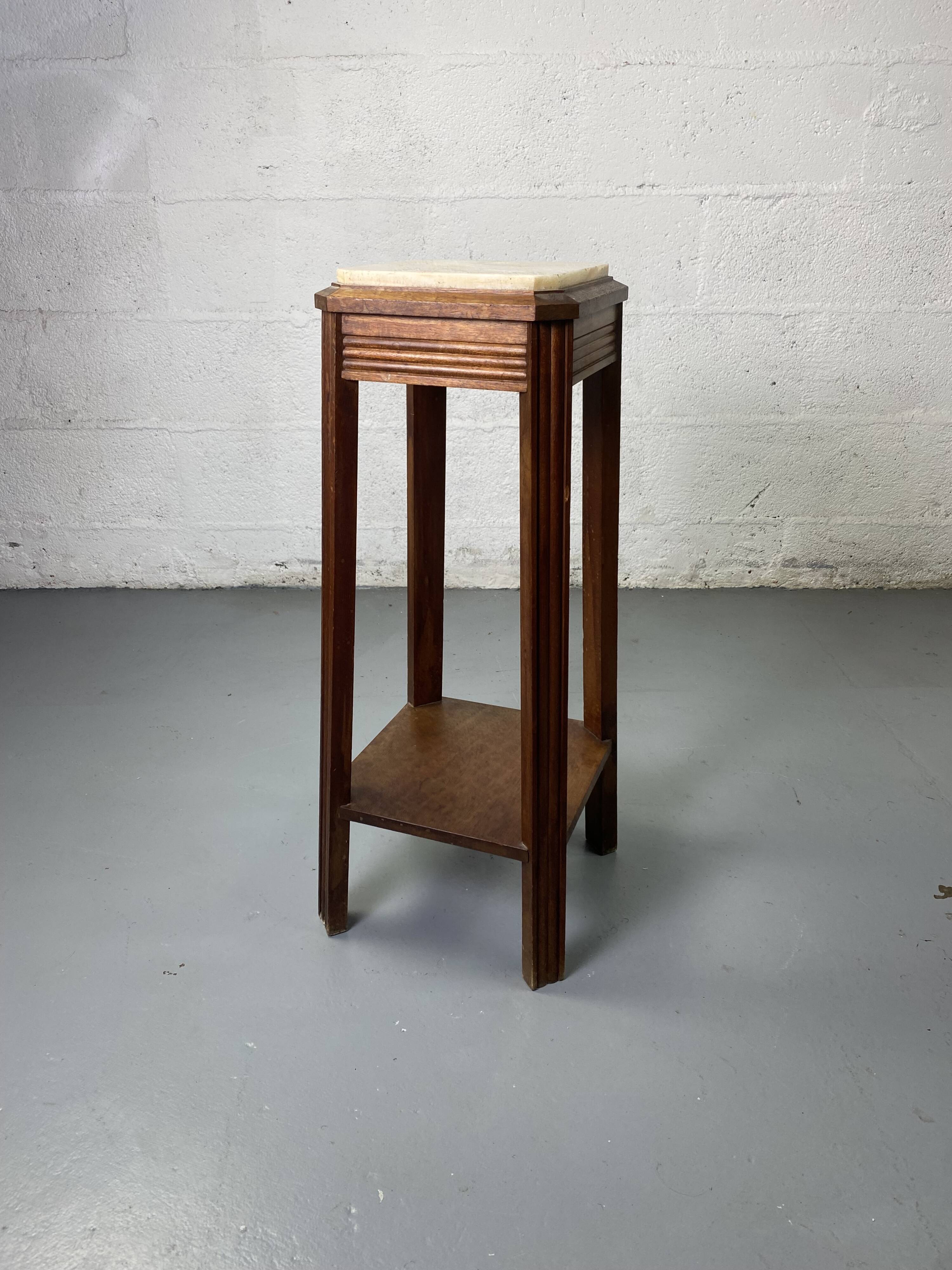 Wooden stool with marble top