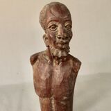 Bust Man in carved wood.