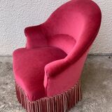 Old raspberry velvet toad armchair