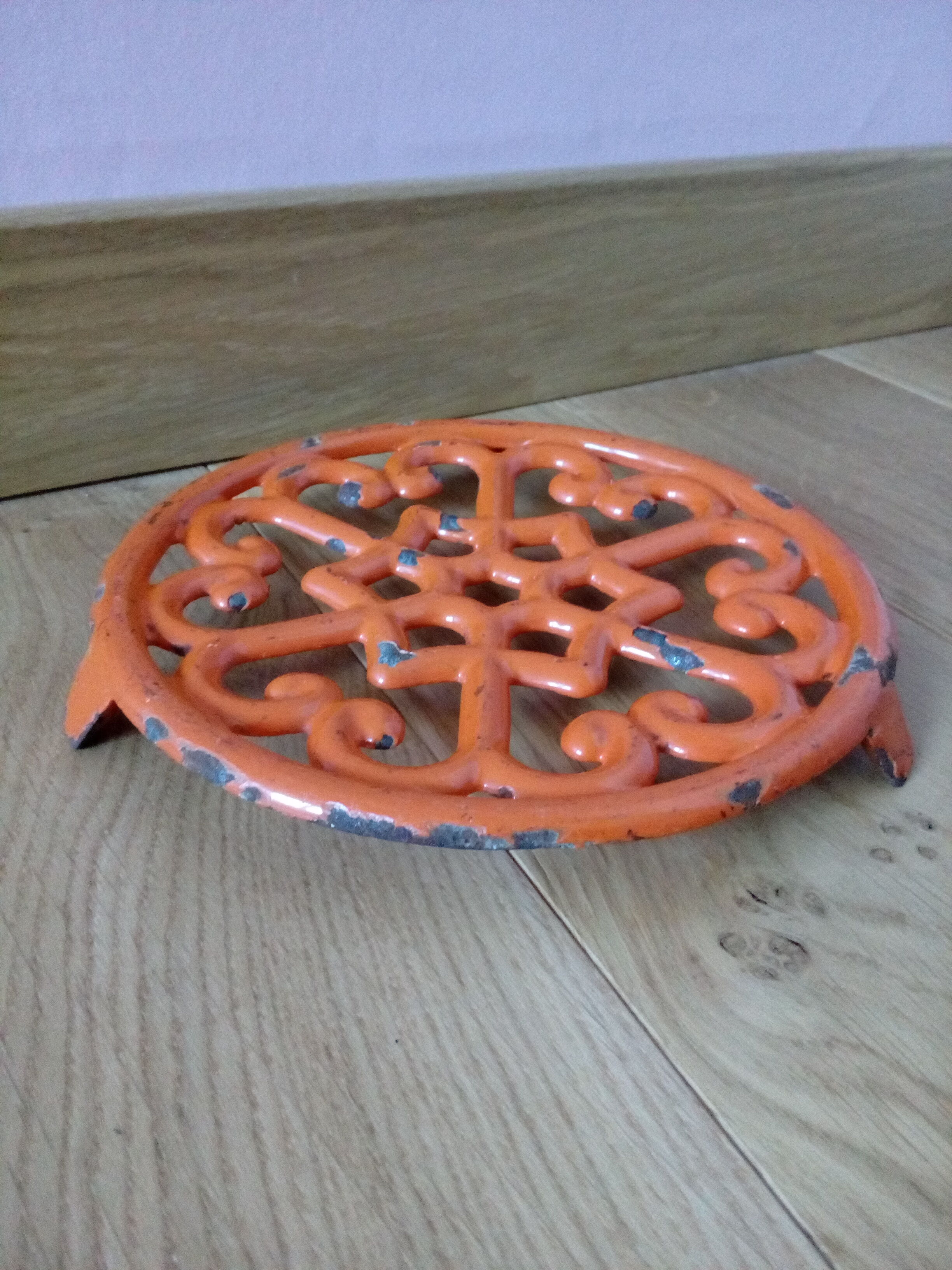 Orange enamelled cast iron dish