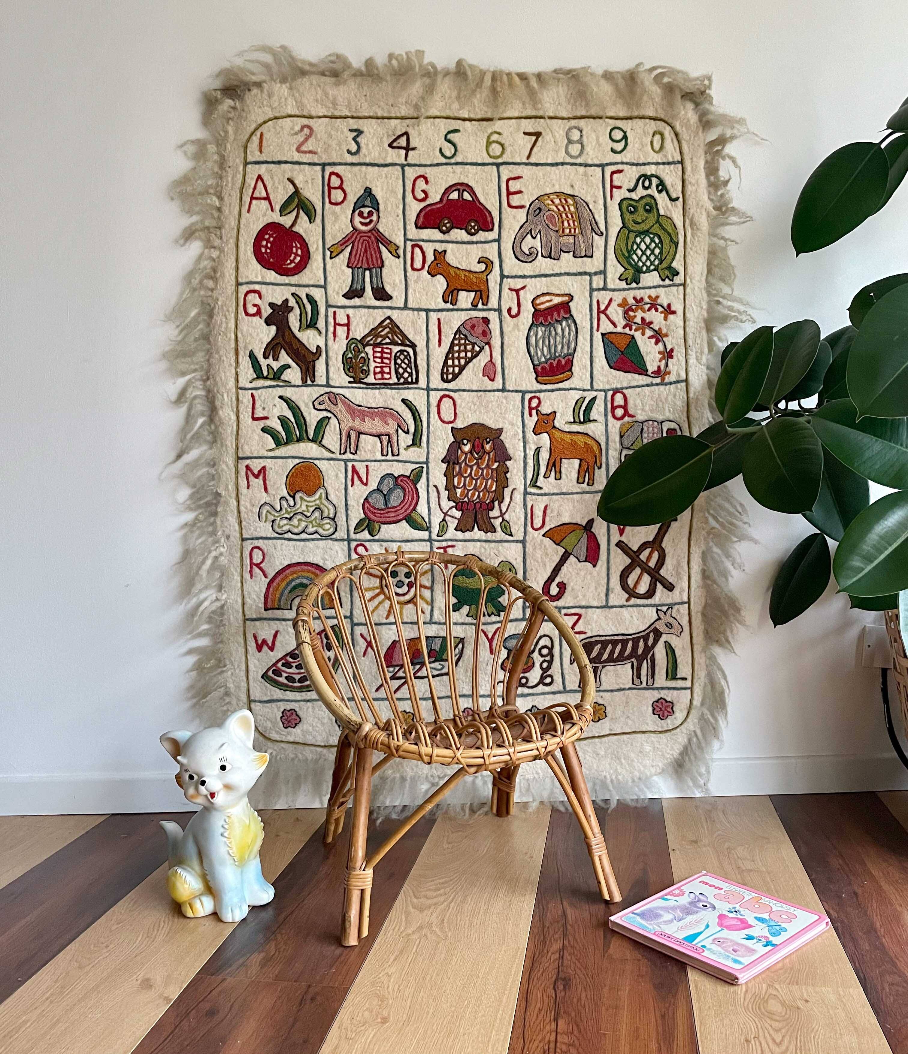 Vintage alphabet wall rug