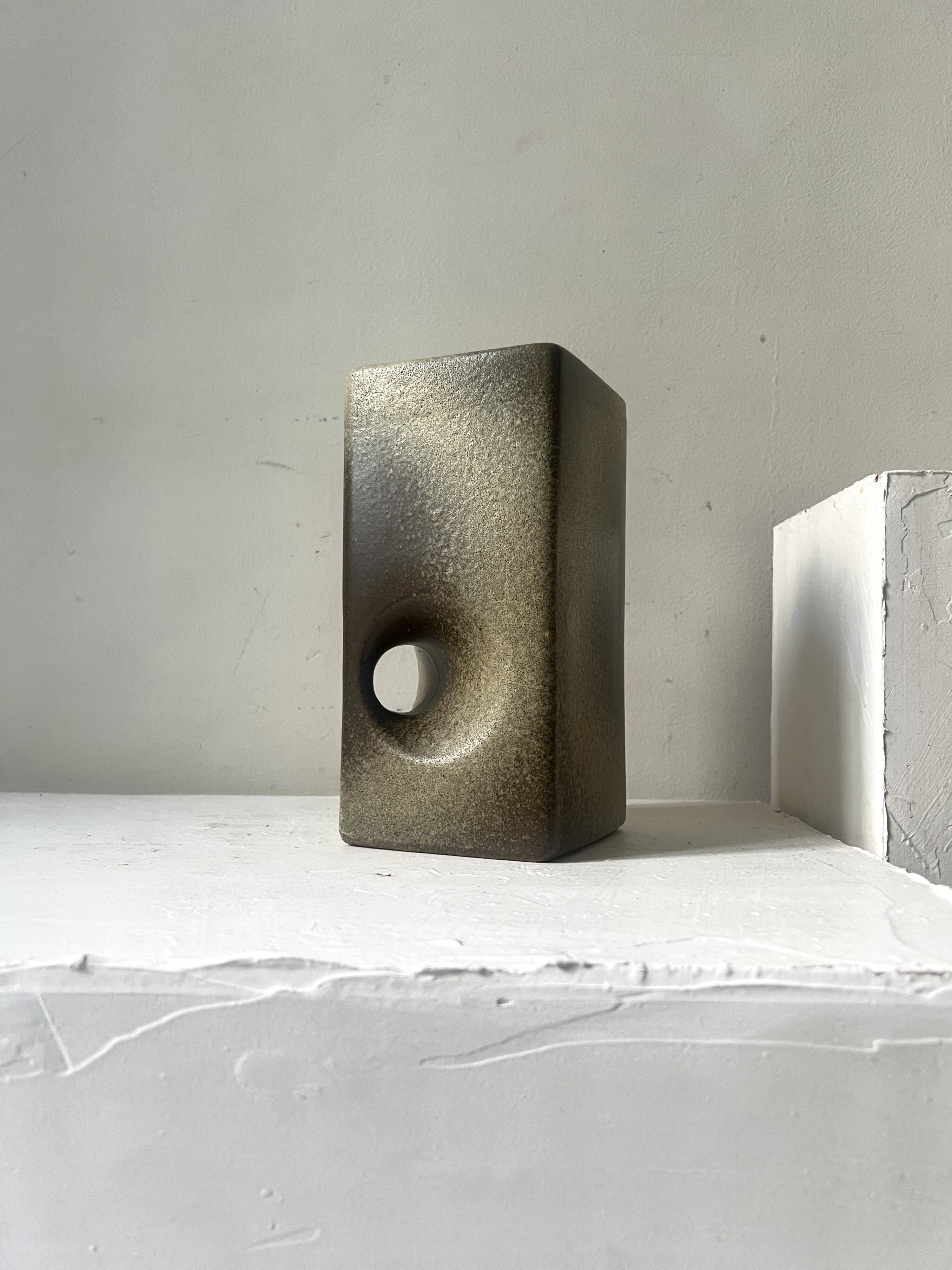 The modernist vase is German, VEB Haldensleben Fat Lava 1970.