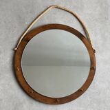 Vintage round wooden wall mirror with hooks