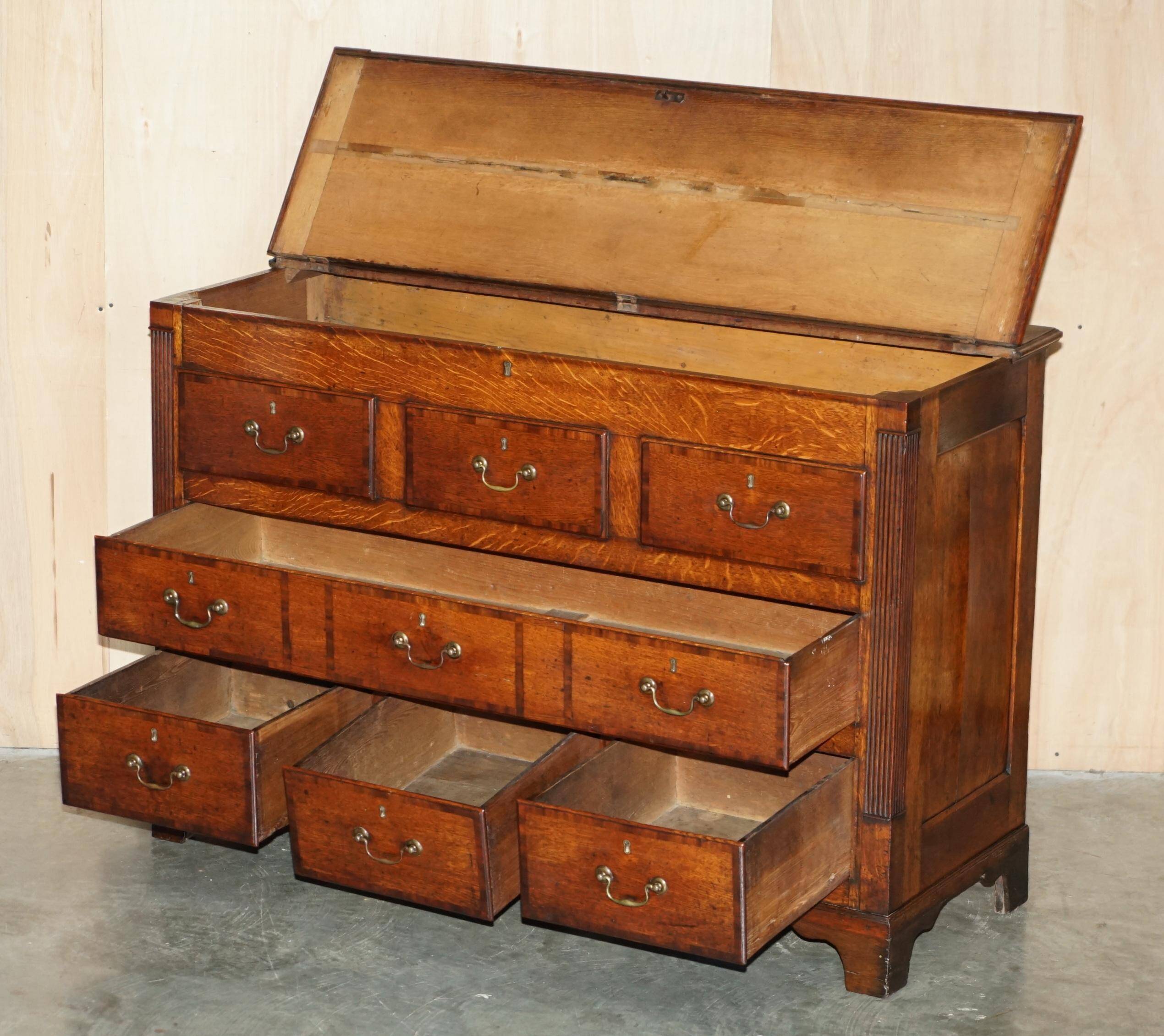 Georgian oak commode with a folding top, English, 18th century.