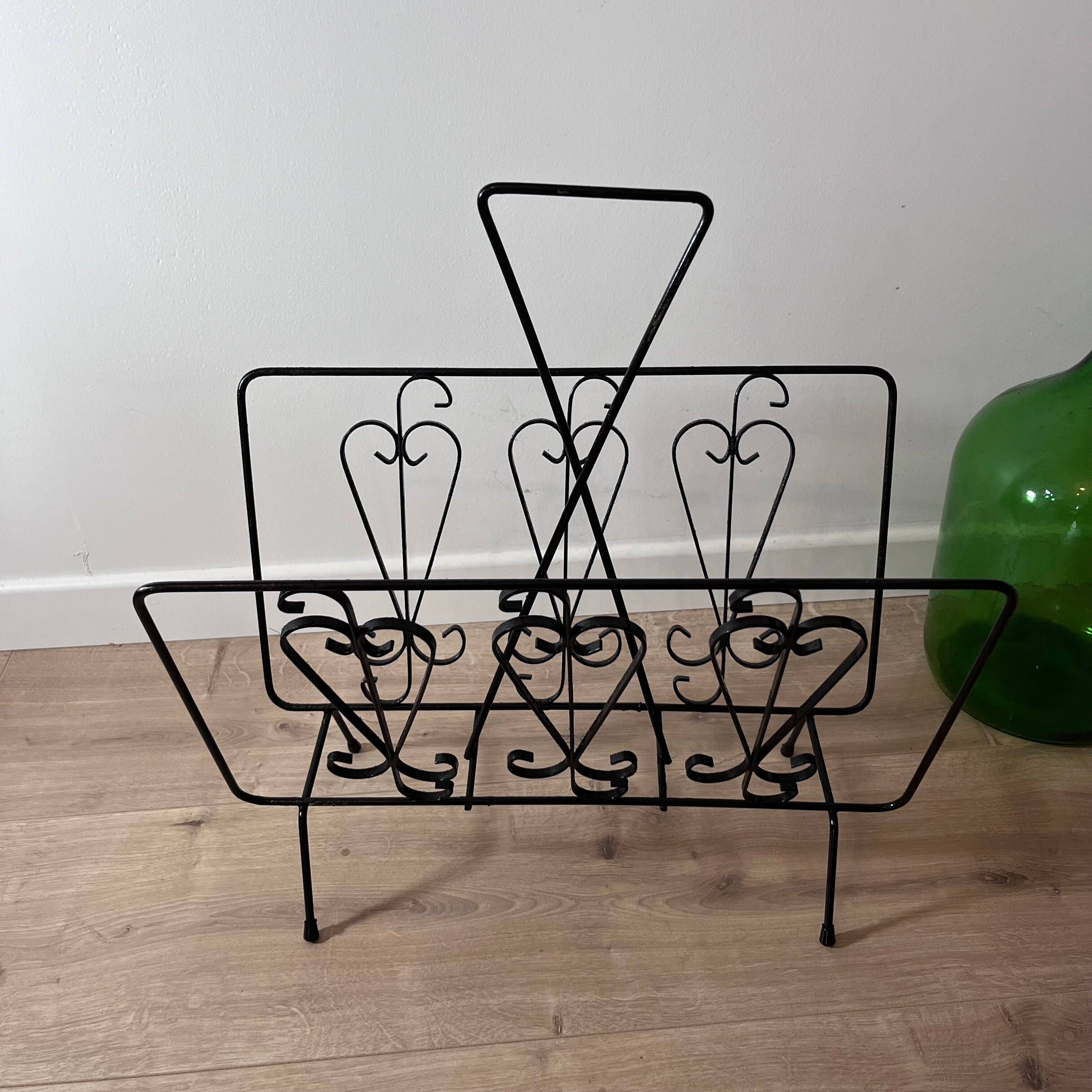 Black steel magazine holder