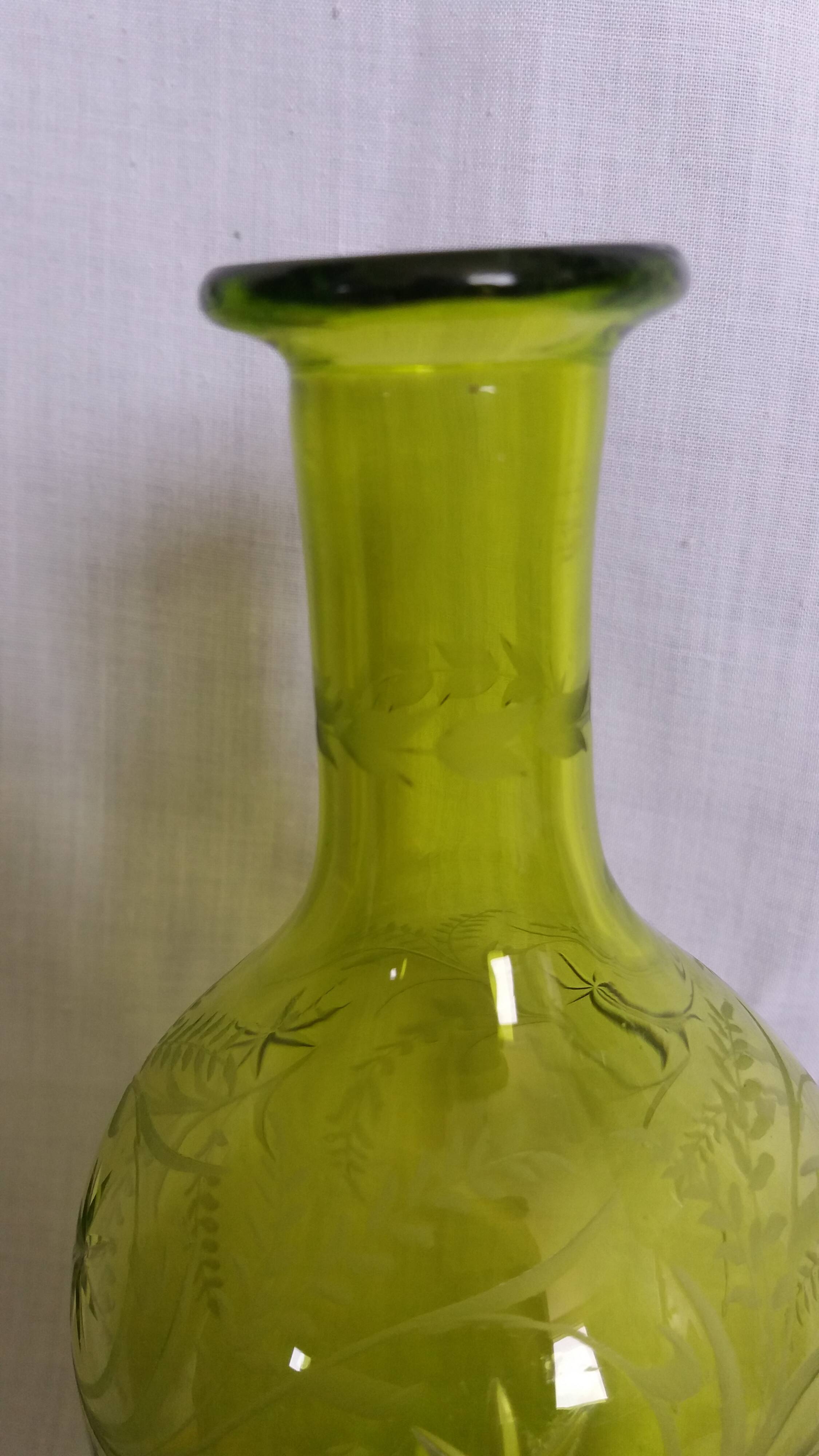 Cut and engraved green blown glass carafe vase