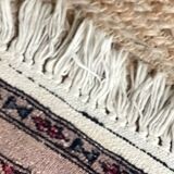 Antique Persian rug, signed.