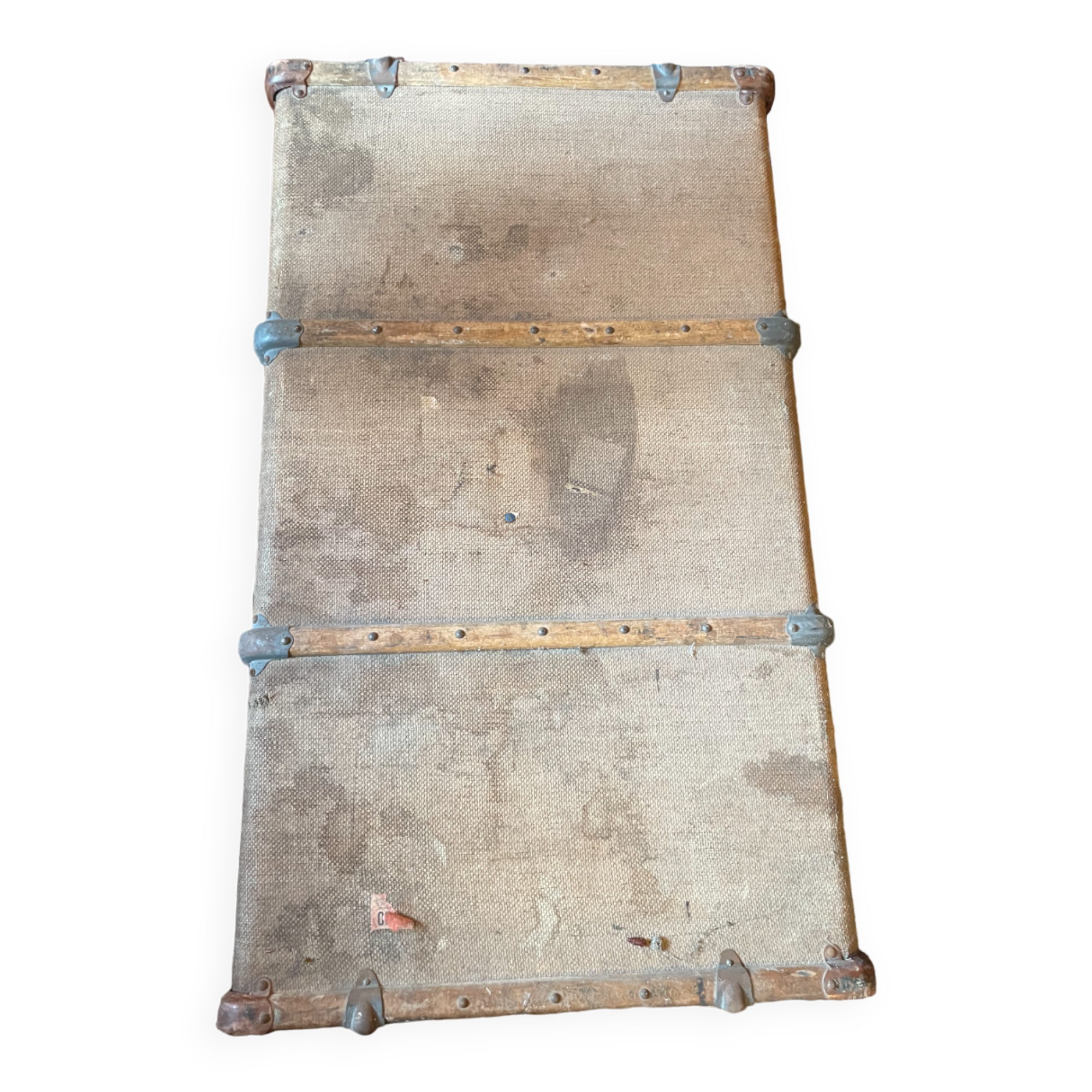 Old flat trunk totally covered with jute and wooden sleepers