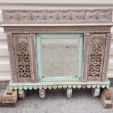 Fully hand-carved stone window with mirror