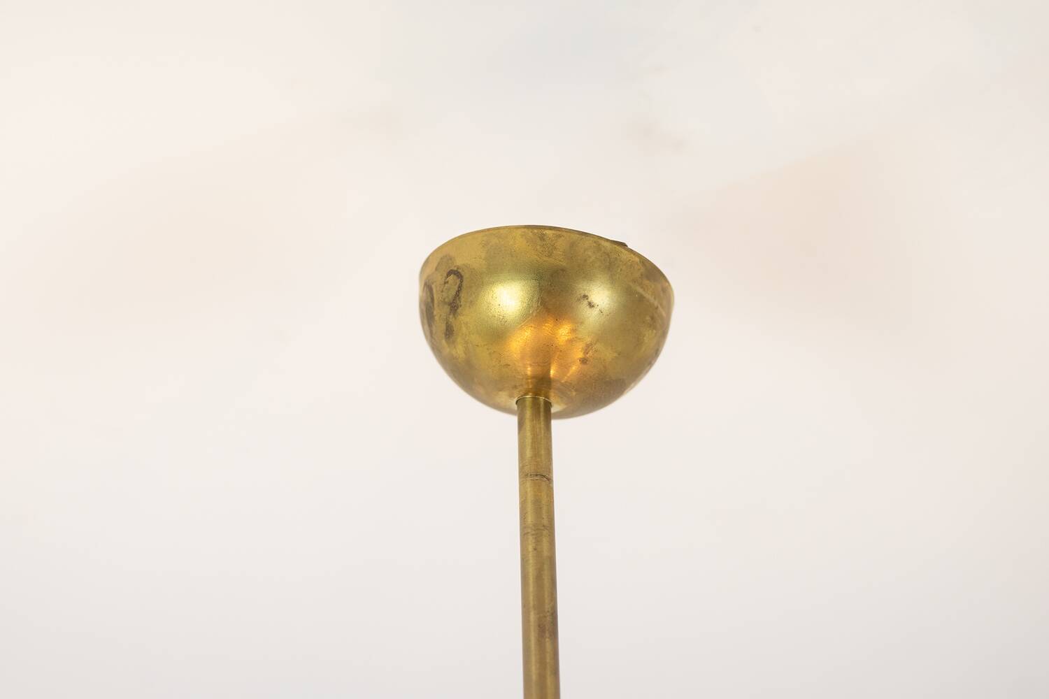 Pair of matte gold-plated brass chandeliers. Italian work from the 1970s.
