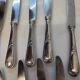 12 silver-plated knives
