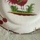 Assiette en faience st clement coq aux cerises 20 eme
