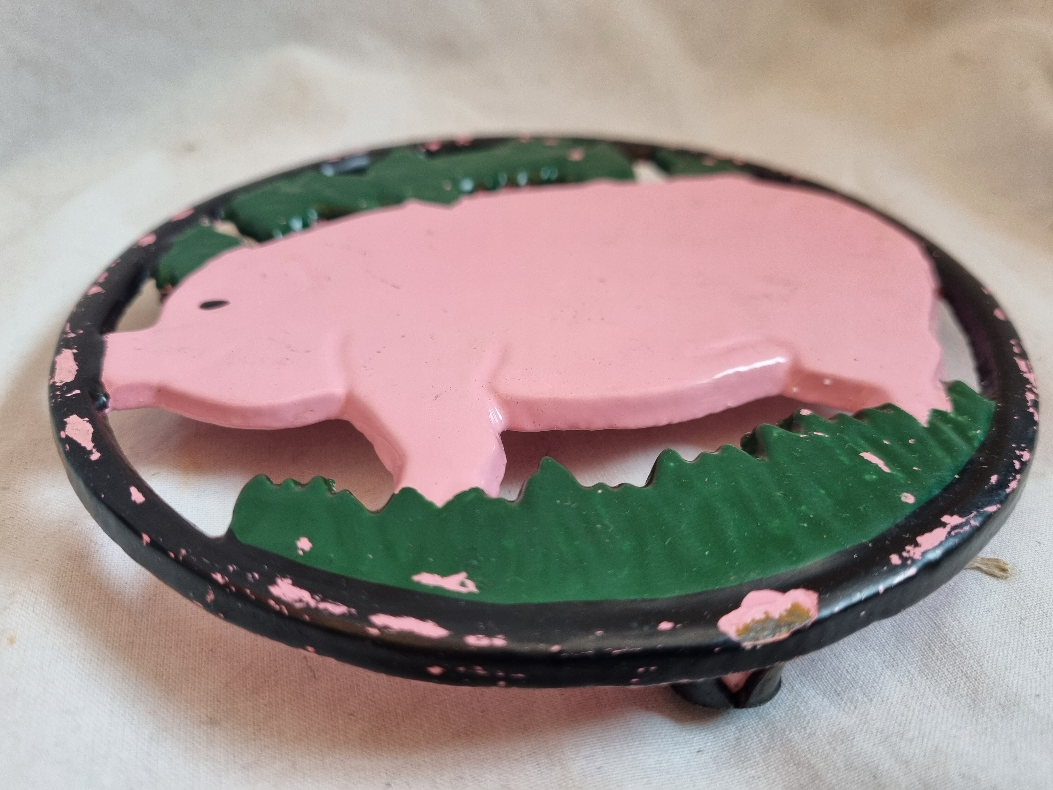 Cast iron underside, pink pig