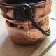 Old copper pot cover with cove