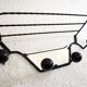 Wrought iron wall rack