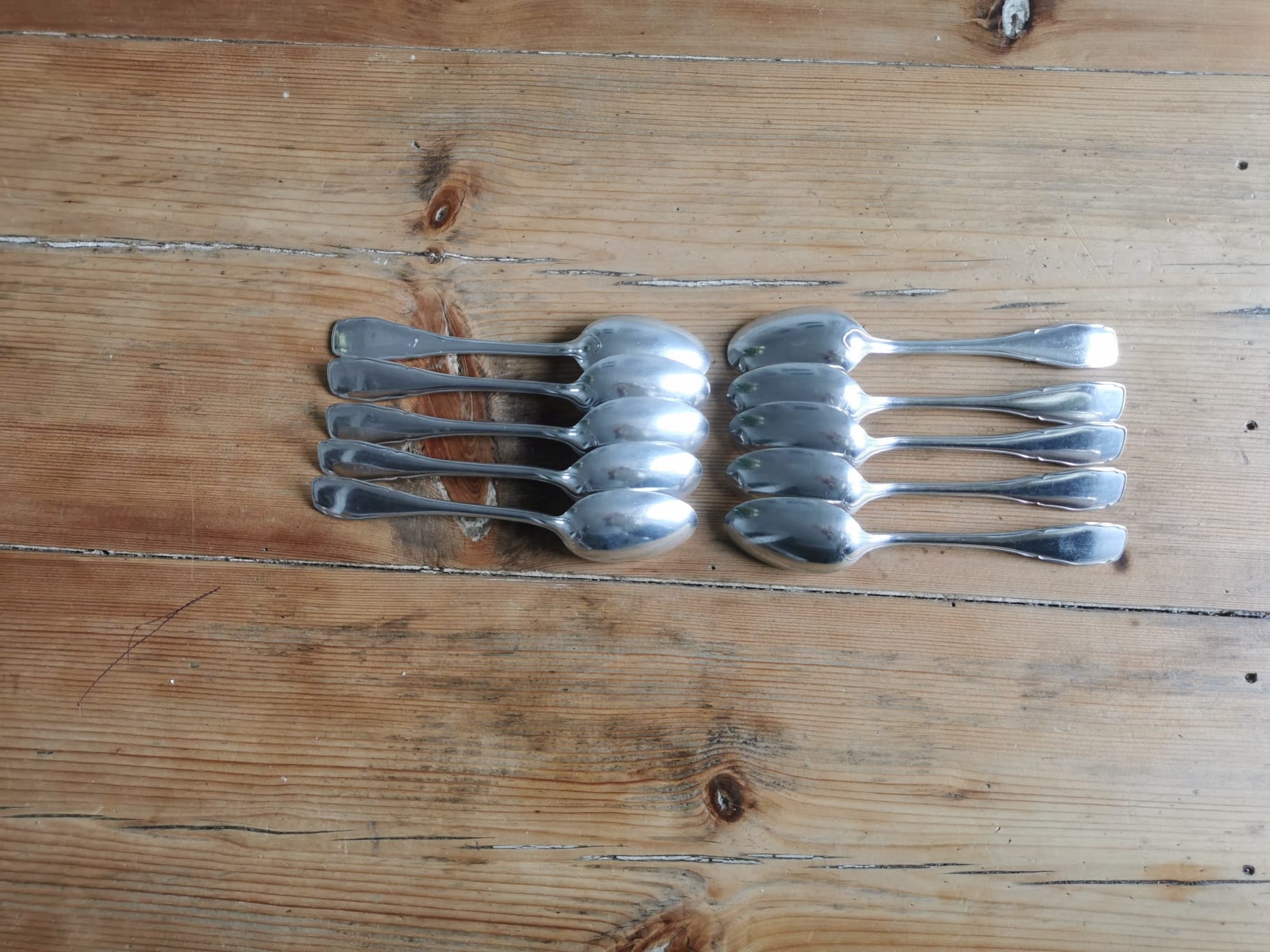 Set of 10 small silver metal spoons