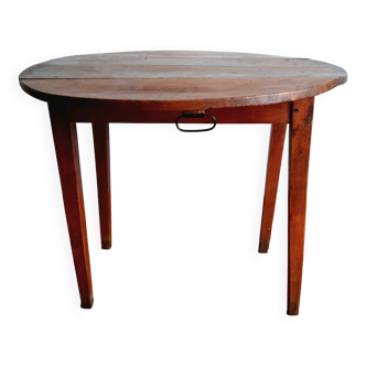Antique round walnut table with flaps