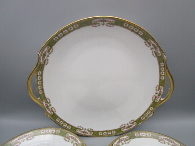Old dessert service in Limoges porcelain