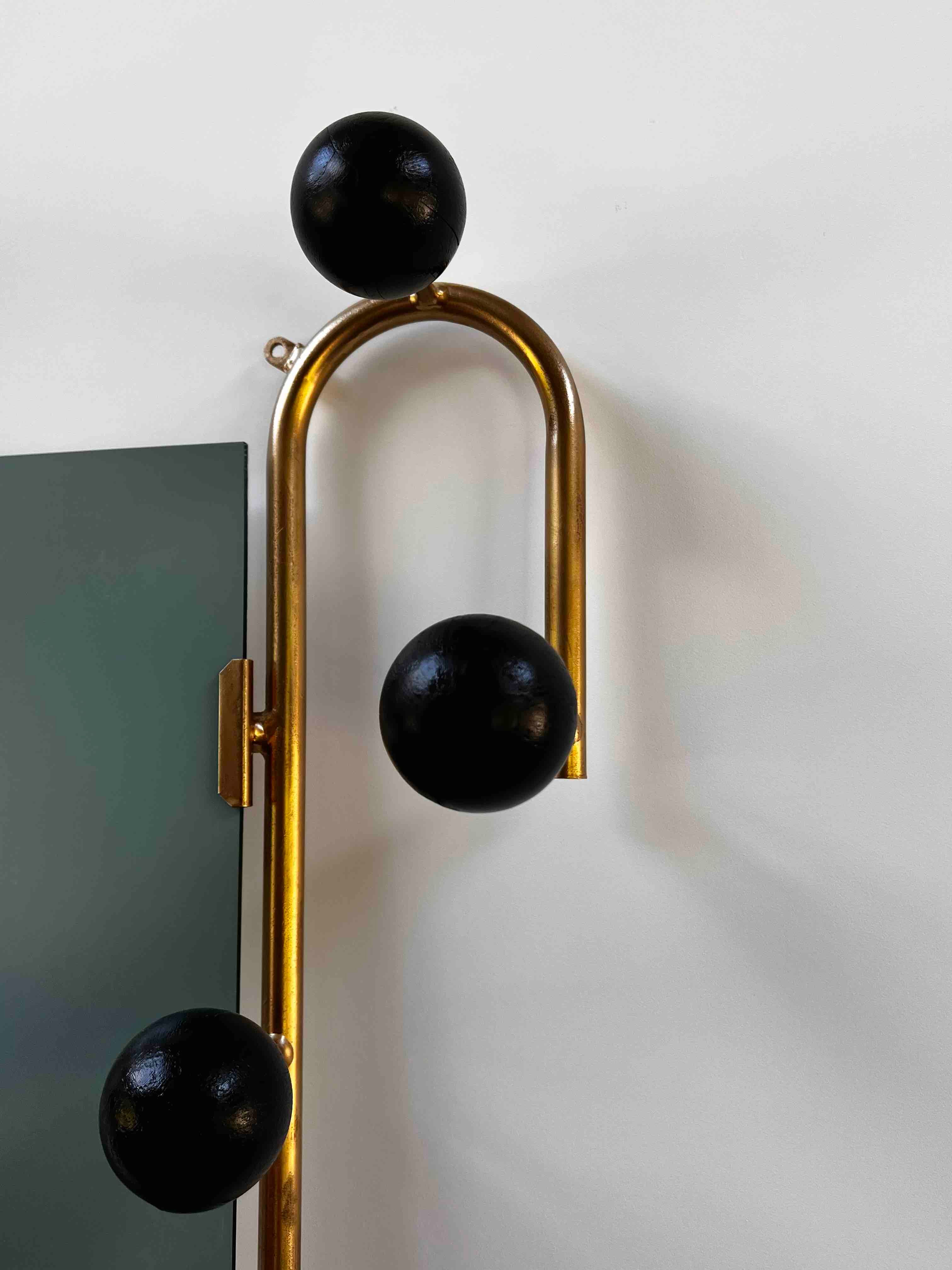 Porte manteau sur pied doré