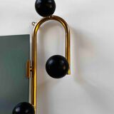 Coat rack on golden stand