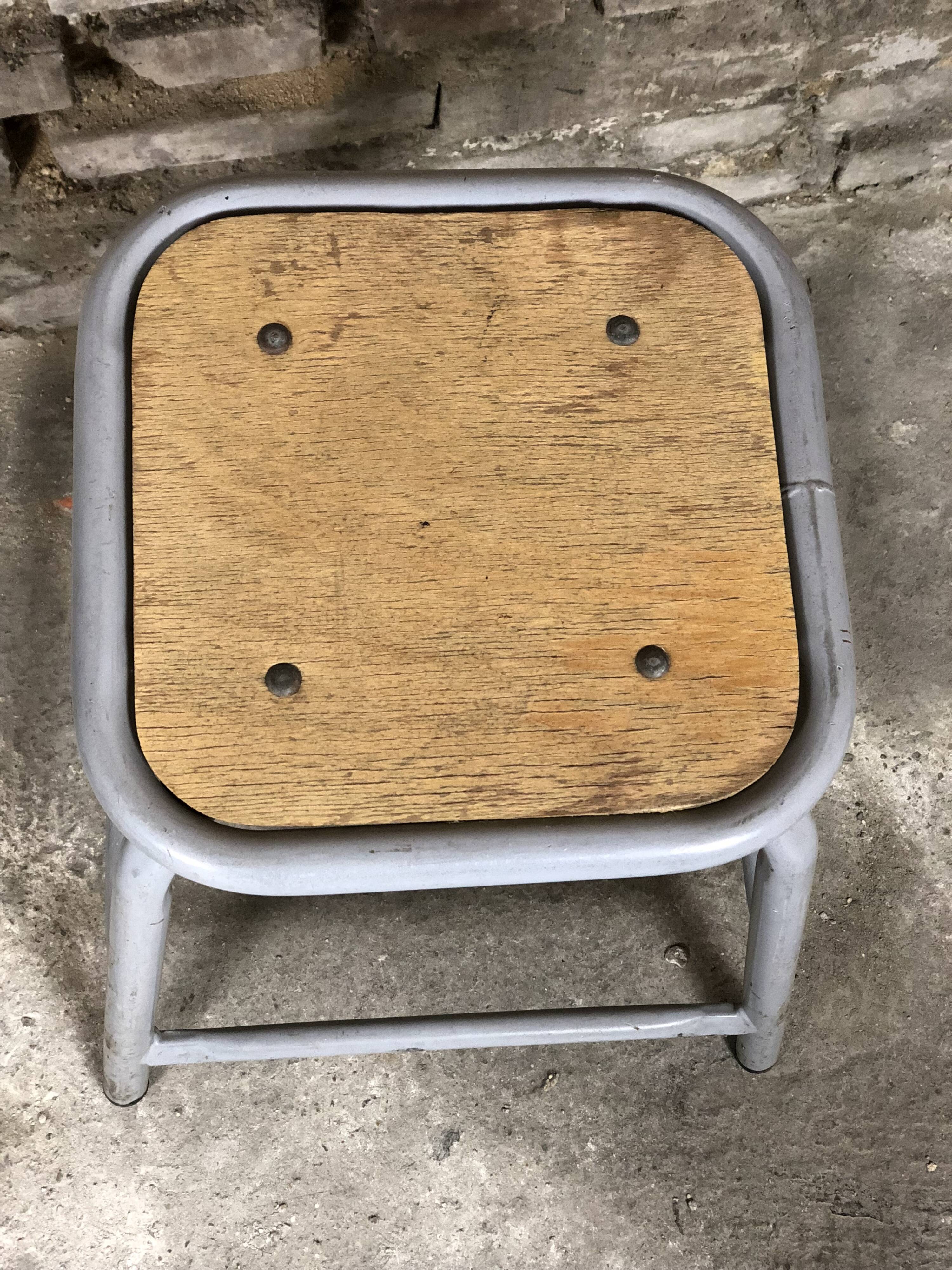 Iron and gray wood stool