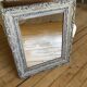 Antique patinated mirror