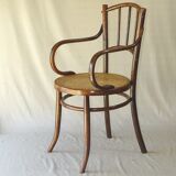 Small canned armchair; in curved wood, bistro, 1890