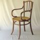 Small canned armchair; in curved wood, bistro, 1890