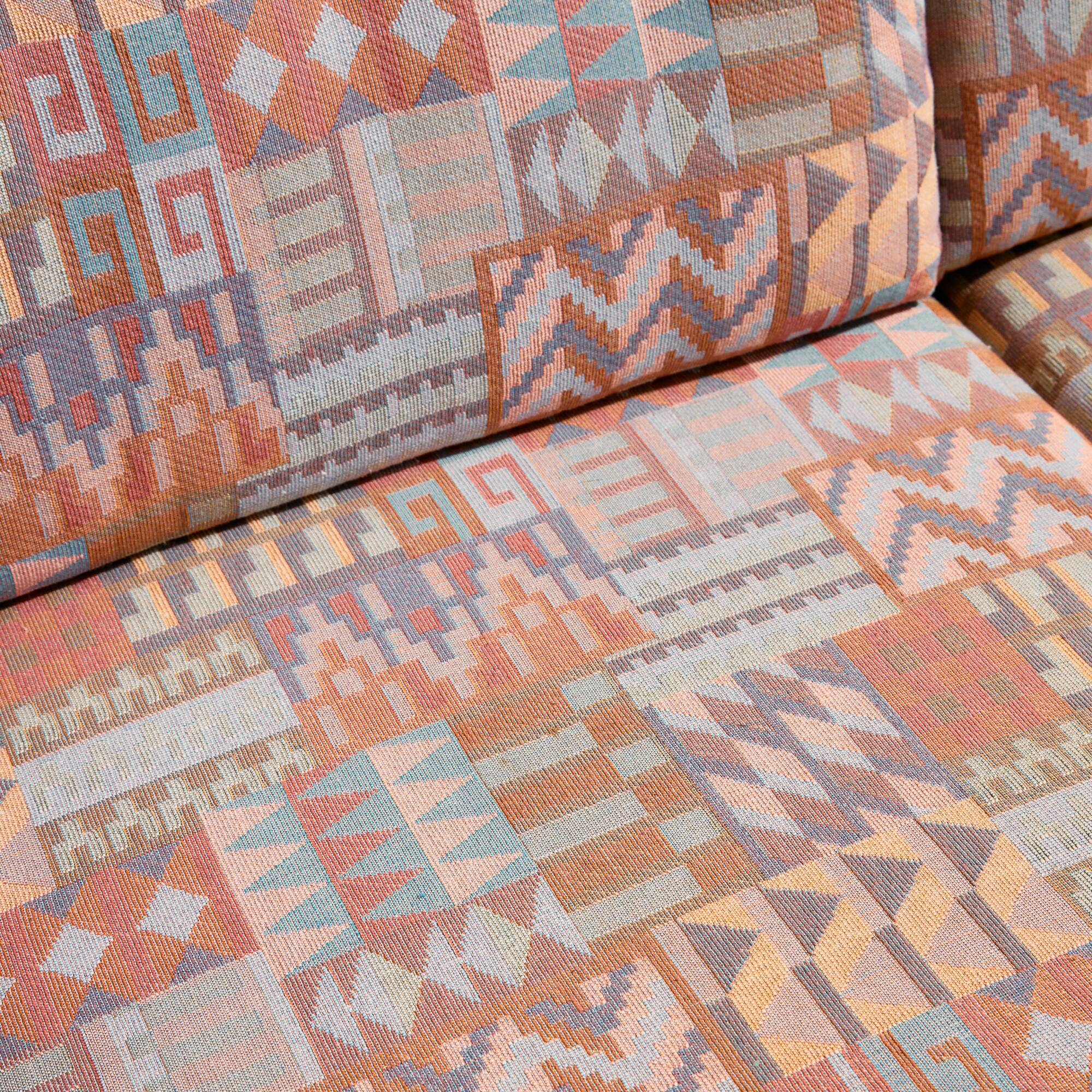 Three-seater teak sofa