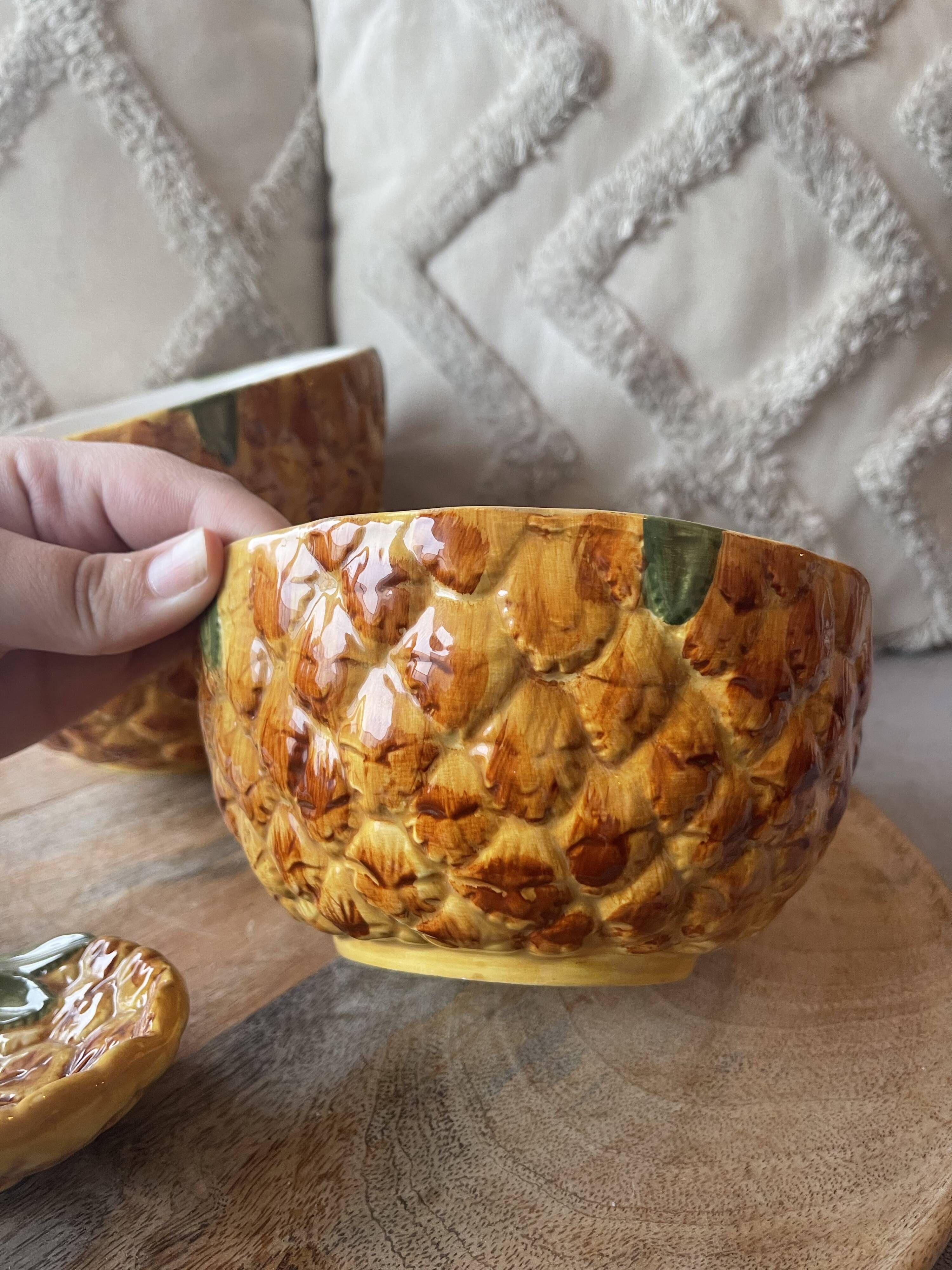 Old set of bowls and spoons in the shape of vintage pineapple