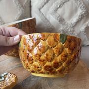 Old set of bowls and spoons in the shape of vintage pineapple