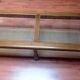 Coffee table in wood, glass and rattan